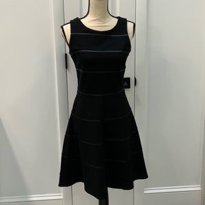 White House Black Market black dress. Zips in Back. Size 0 in WHBM